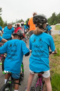 Students biking to school in "I biked to school today" t-shirts.