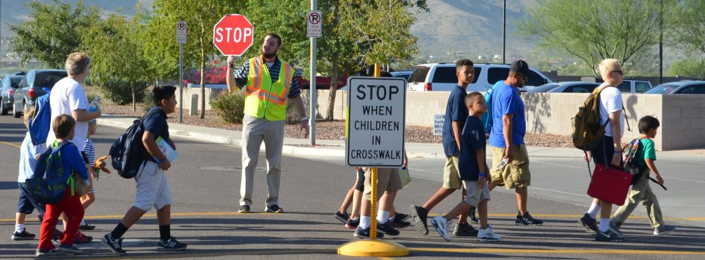 Students using a crosswalk in Phoenix, Arizona.