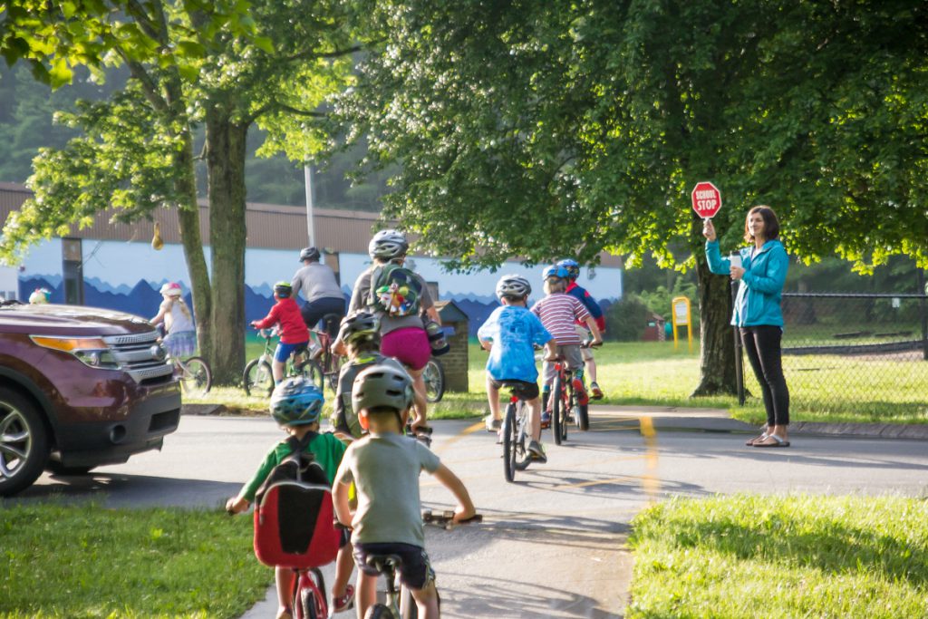 Children bike to school.